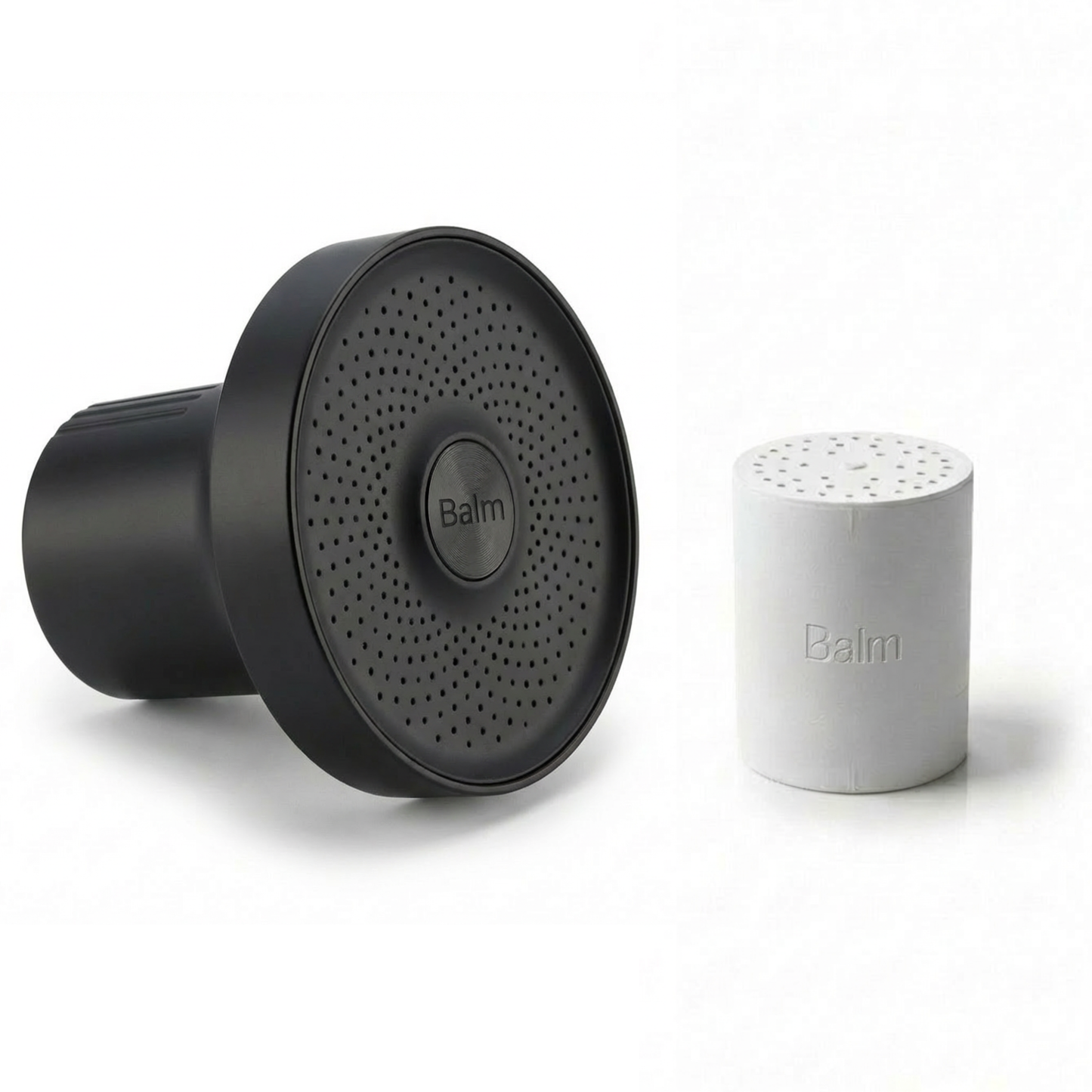 Black and white salt and pepper shakers with 'Balm' branding on a white background